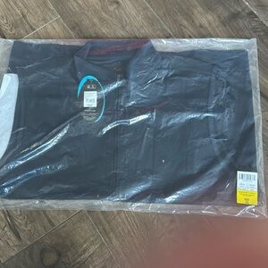 New In original package Greg Norman NVY Weatherknit Jacquard Full Zip Vest Large